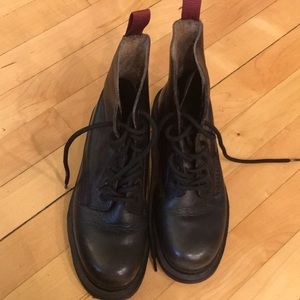 Black Doc Martens Worn Leather boots.